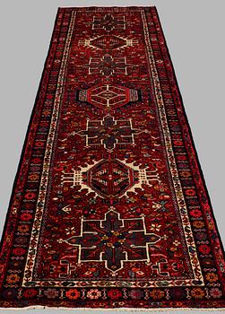 A SEMI-ANTIQUE KARADJA RUNNER, AROUND 320 x 100 cm.