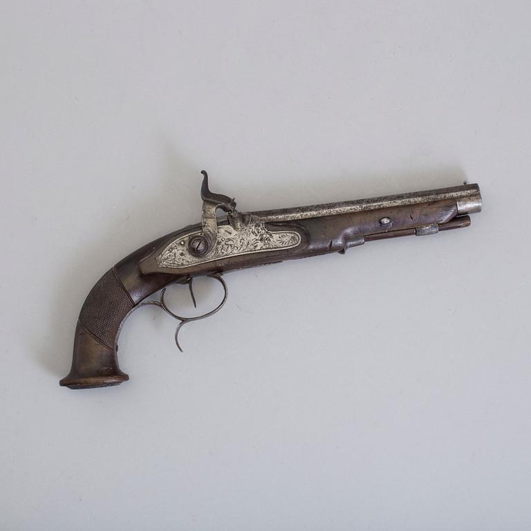 A 19th century percussion pistol.