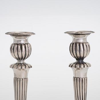 A pair of silver candlesticks, maker's mark of Roland Mellin, Helsinki 1836.