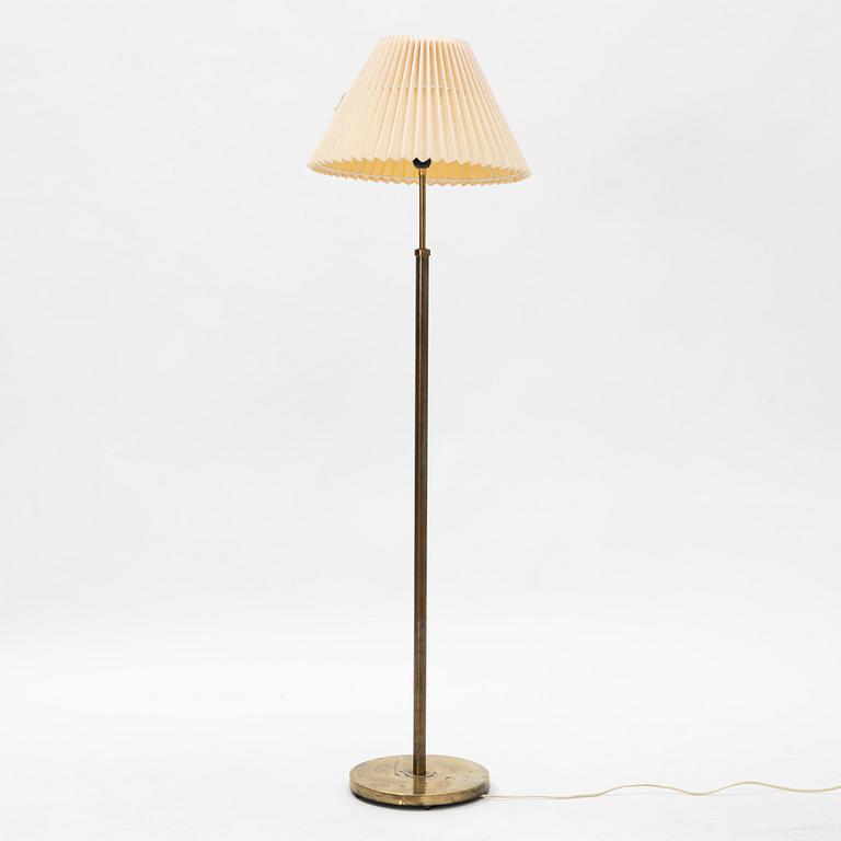 A brass floor light, seond part of the 20th Century.