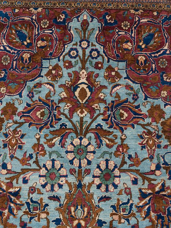 A RUG, a semi-antique silk Kashan, ca 201,5 x 122-130 cm.