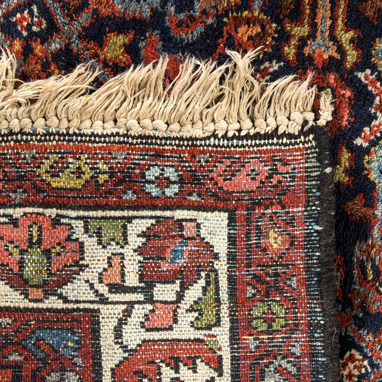 A semiantique Hamadan carpet ca 210 x 110 cm.