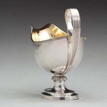 A Swedish 19th century parcel-gilt sauce-boat, mark of Johan Petter Grönvall, Stockholm 1838.