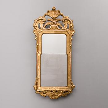 A SWEDISH ROCOCO MIRROR, ca 1770-80.