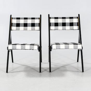 A pair of mid 20th century chairs.