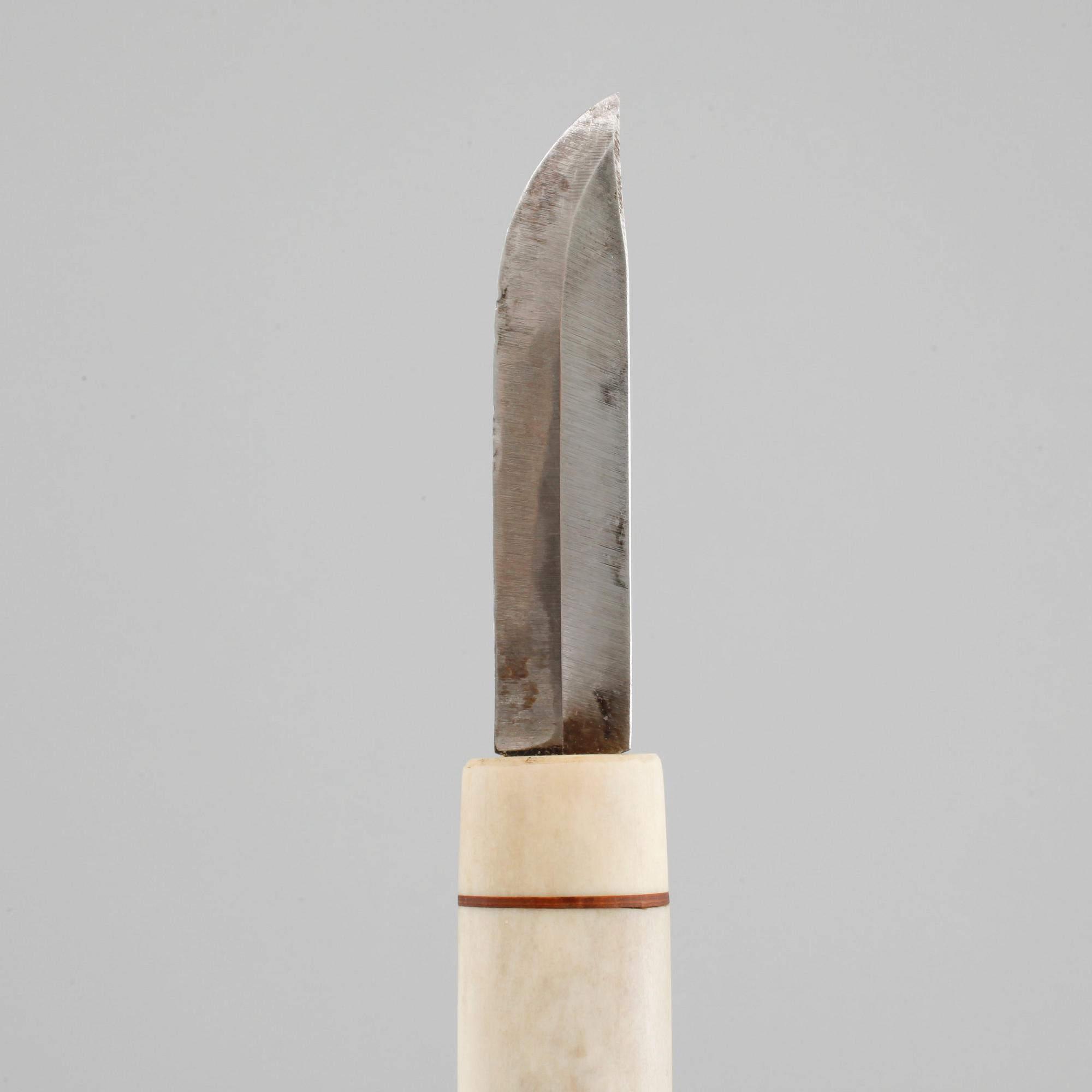 A sami knife made by Nikolaus Fankki, around the middel of the 20th century.