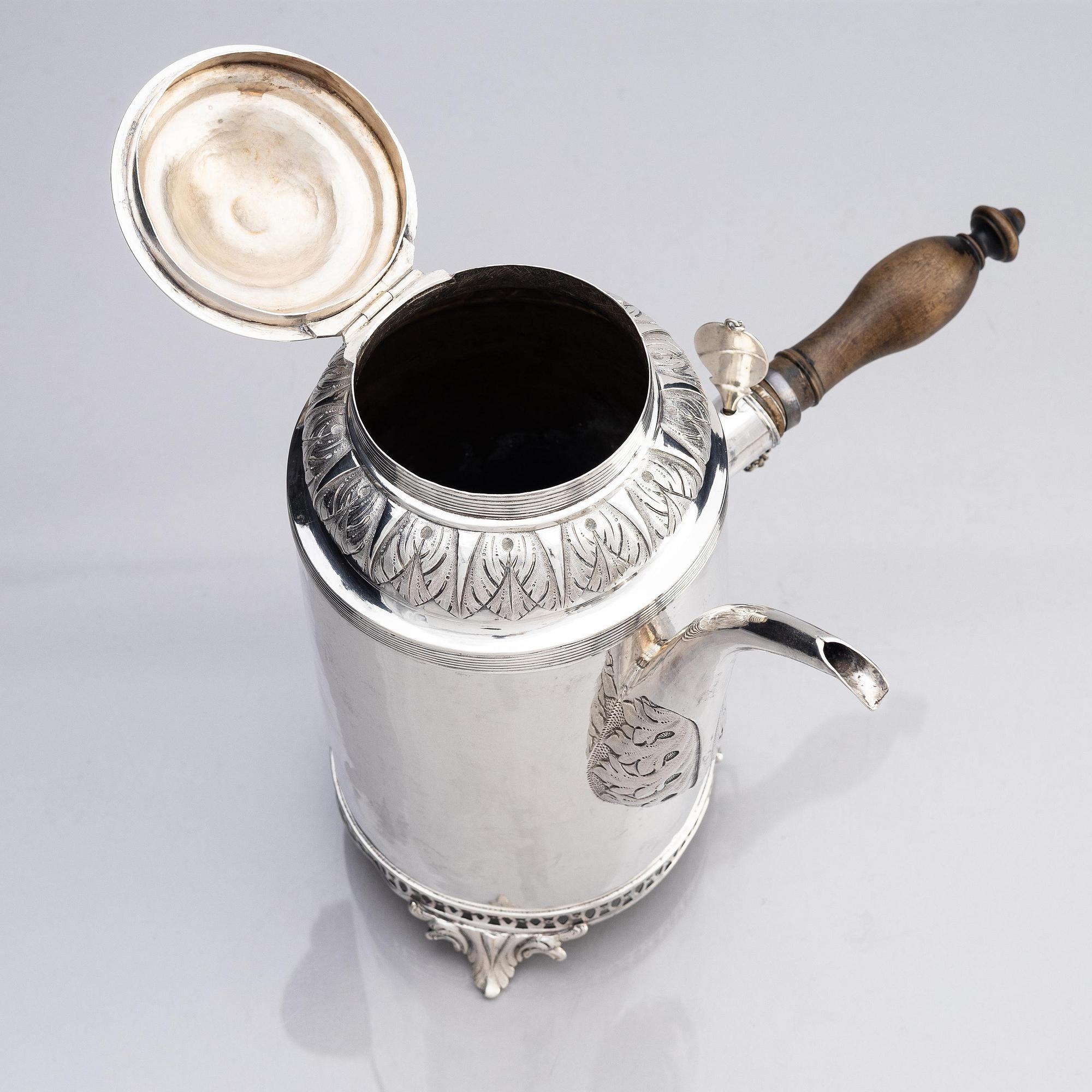 A Swedsih early 19th century silver coffe-pot, mark of Olof Hellbom, Stockholm 1809.