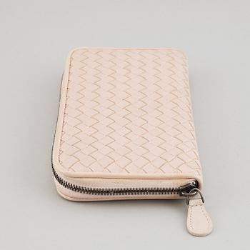 BOTTEGA VENETA, a intrecciato leather wallet.
