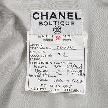 Chanel, a bouclé jacket and skirt, French size 38.