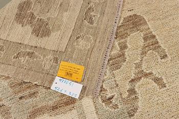 An Ushak design carpet, a. 426 x 307 cm.