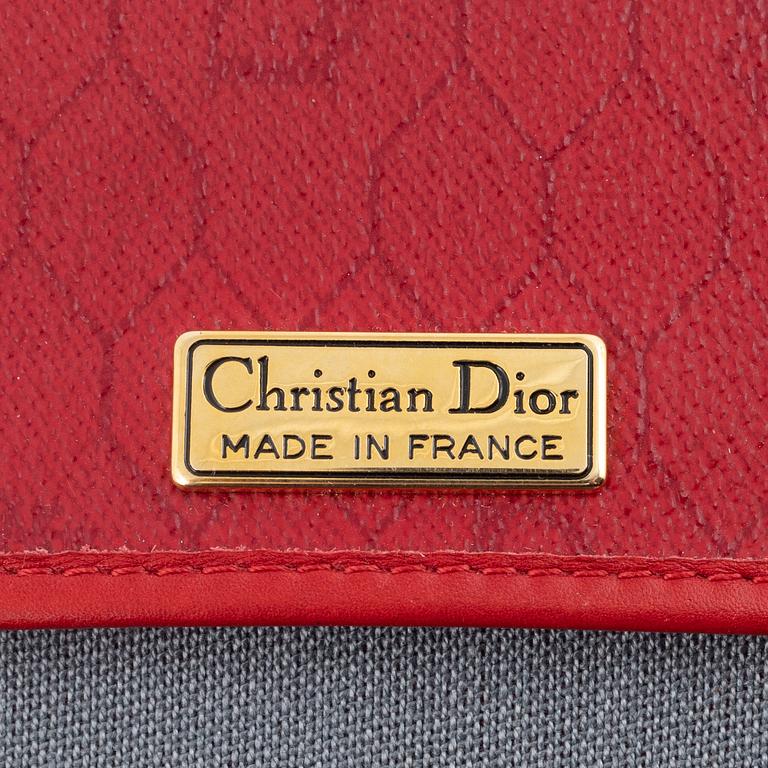 Christian Dior, a red vintage bag.