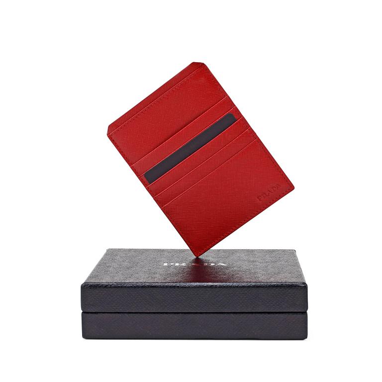 PRADA, a red leather credit card holder.