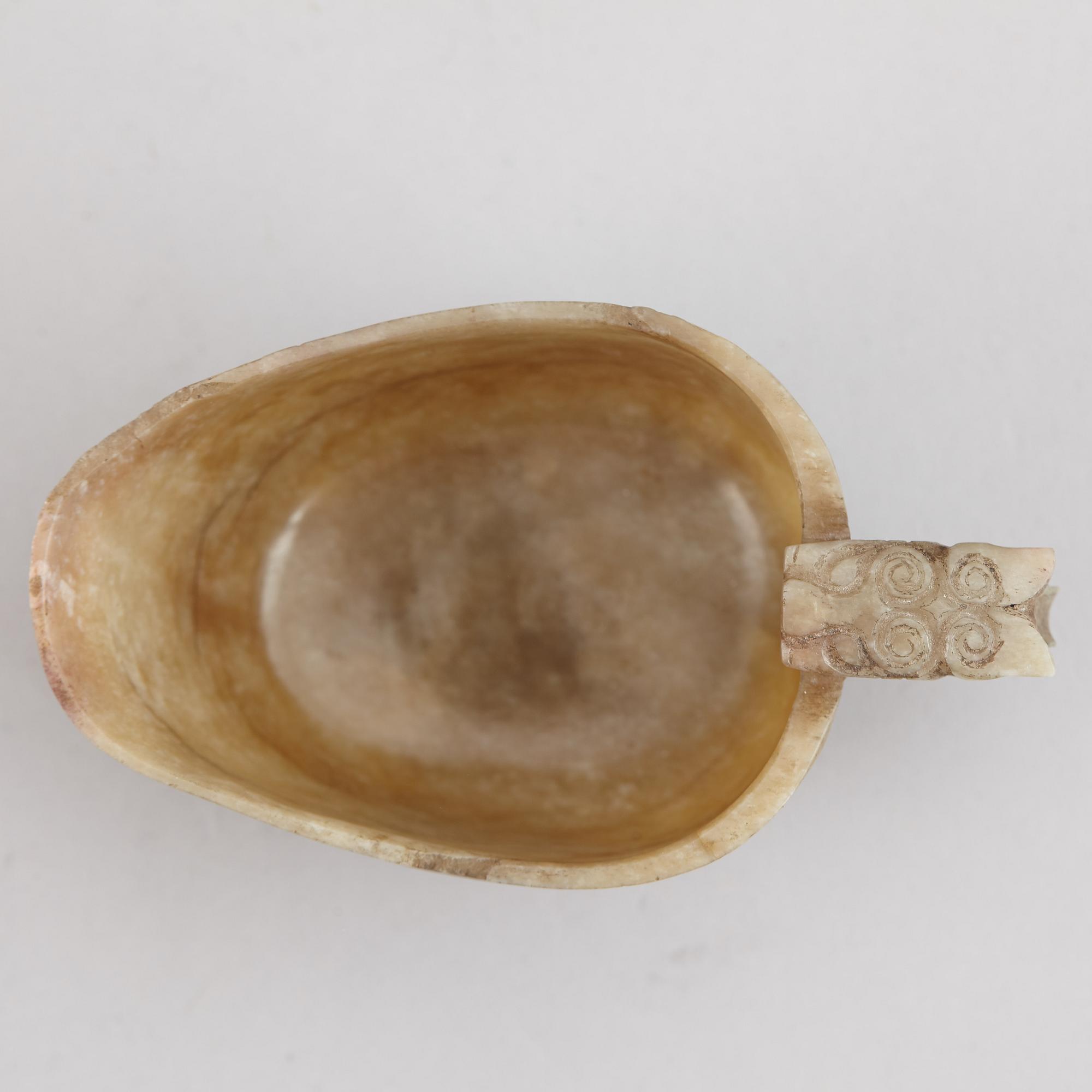 A group of three nephrite objects, Qing dynasty.