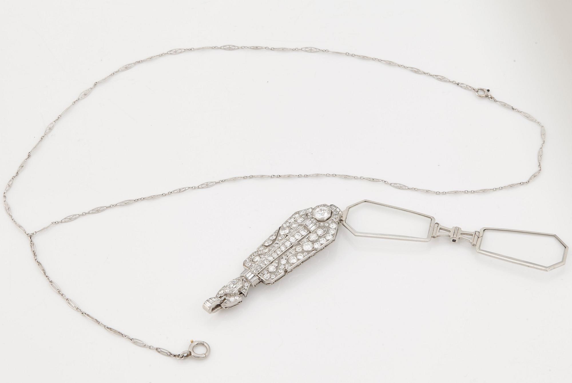 A pair of lorgnettes set with old- single- and baguette cut diamonds.