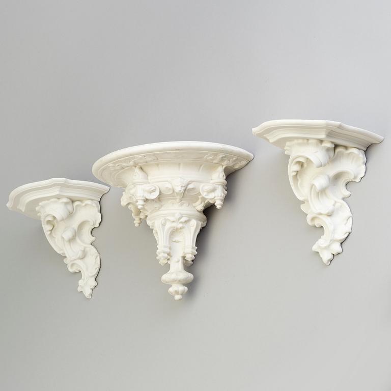 THREE PARIAN WALL BRACKETS, a pair and a single, Gustafsberg 1899.