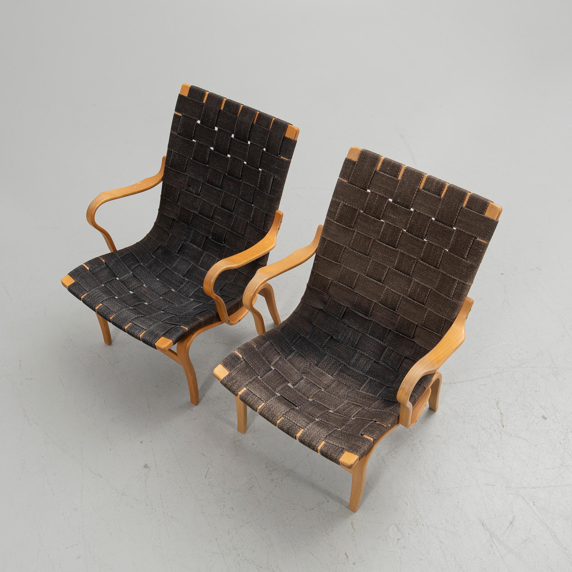 Bruno Mathsson, armchairs, a pair, "Eva", Bruno Mathsson International, Värnamo, second half of the 20th century.