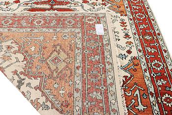 An oriental carpet, c. 296 x 238 cm.