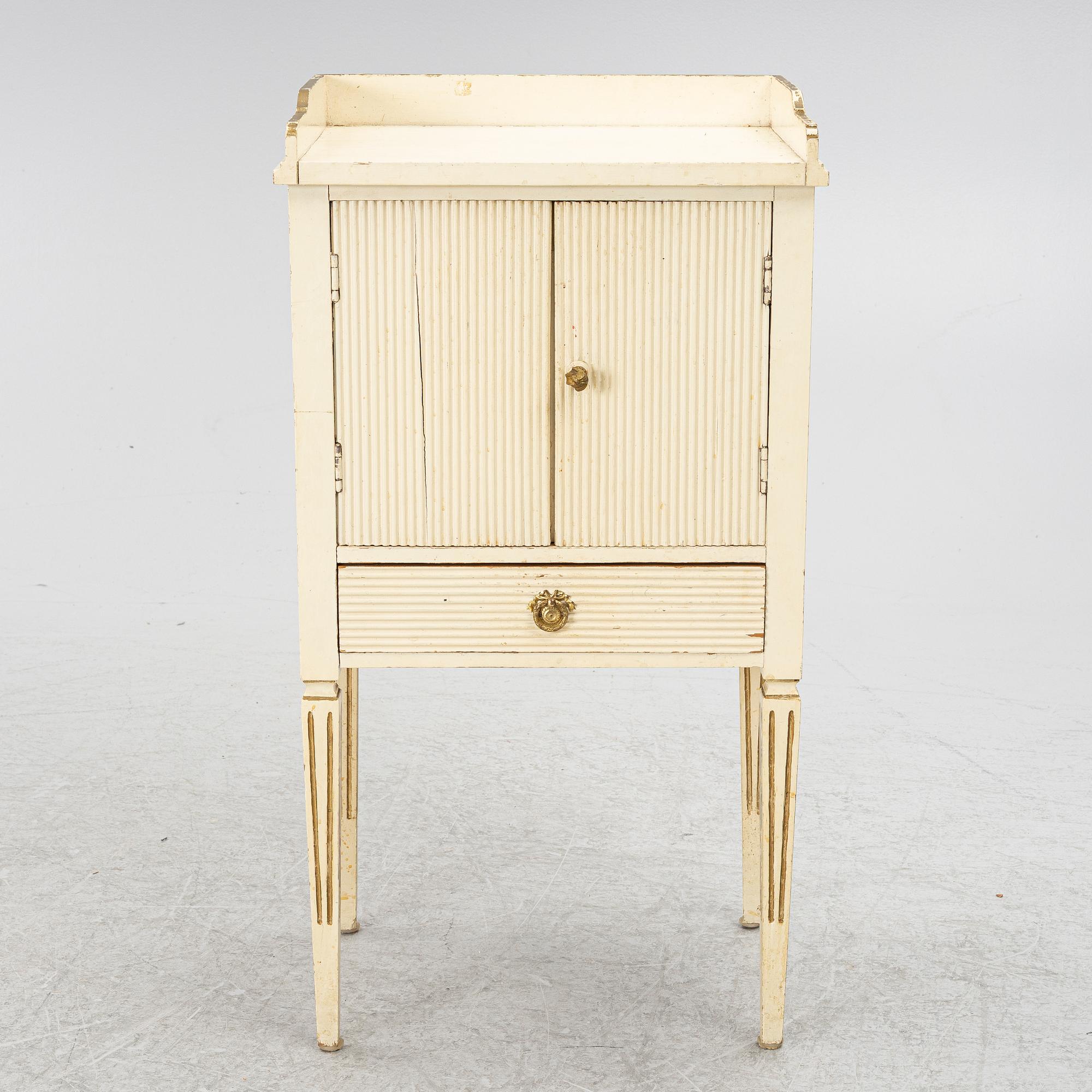 A Gustavian style bedside table, early 20th century.