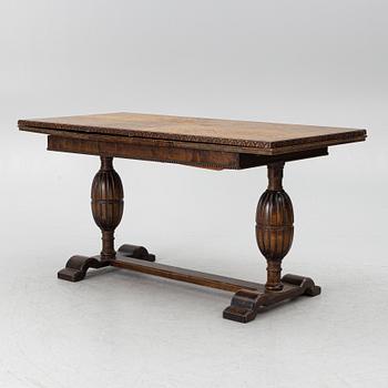 A dining table, 1920s.