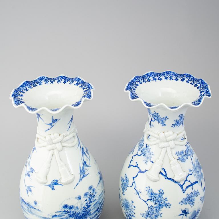 A matched pair of blue and white vases, Japan, early 20th Century.