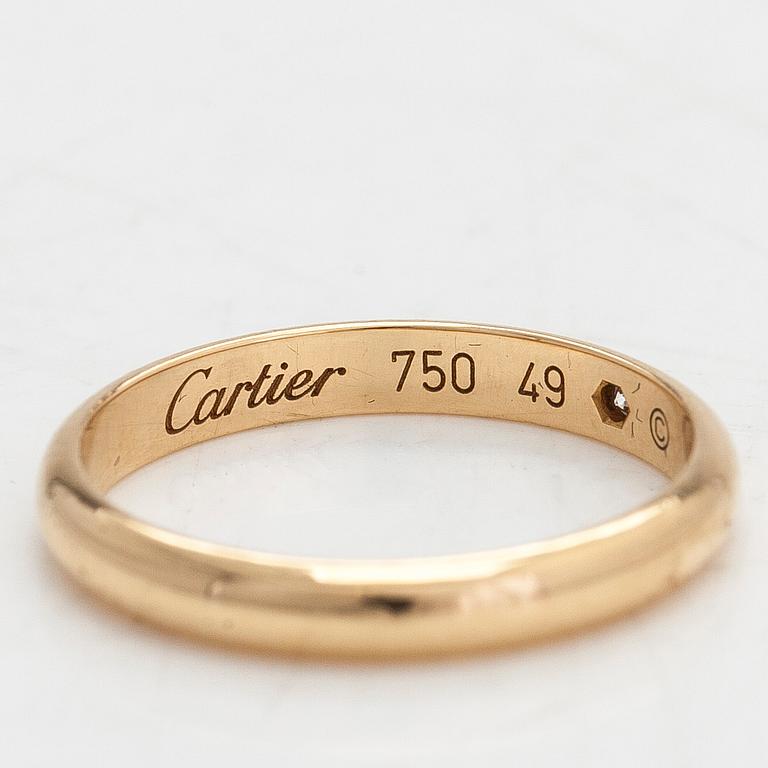 Cartier, an 18K gold '1895' ring with a diamond ca. 0.01 ct.