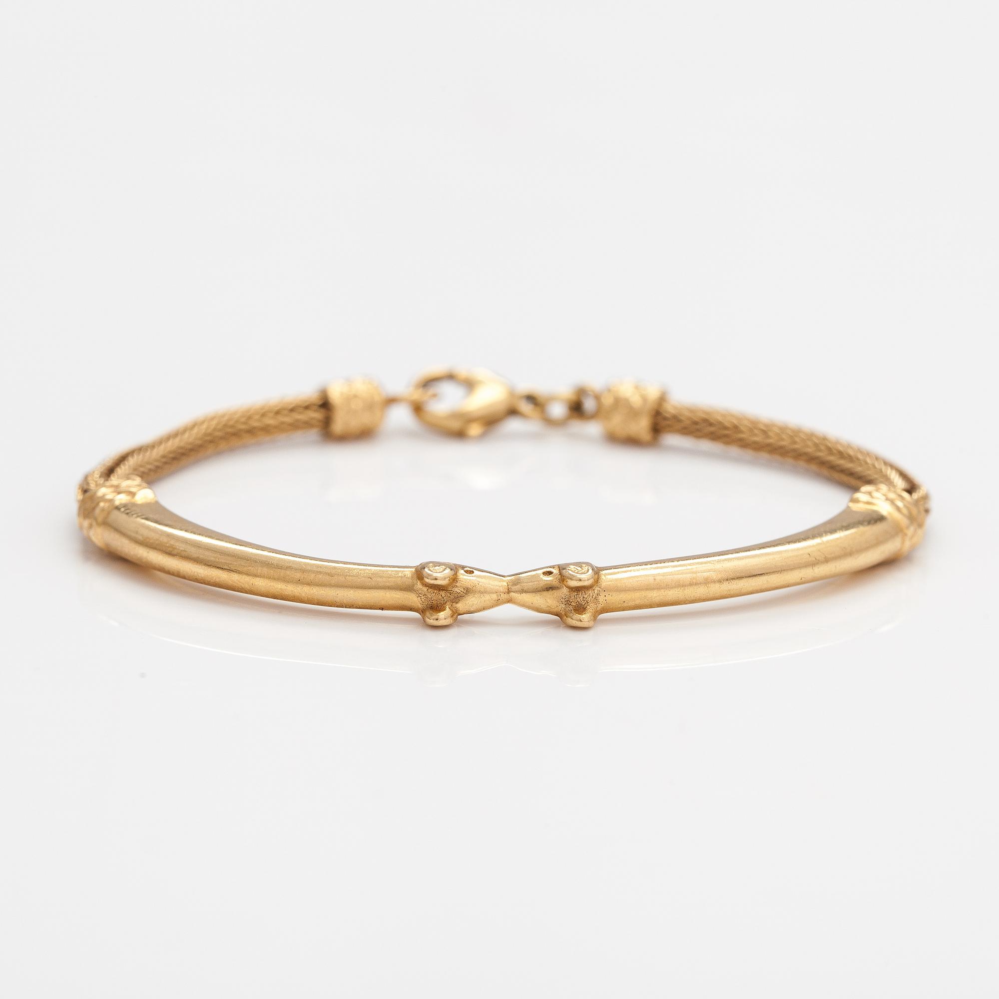 An 18K gold bracelet "Moose head". Kalevala Koru, Helsinki 1999.