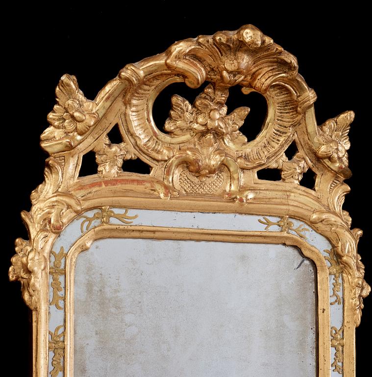 A Swedish Rococo 18th century mirror, dated 1769.