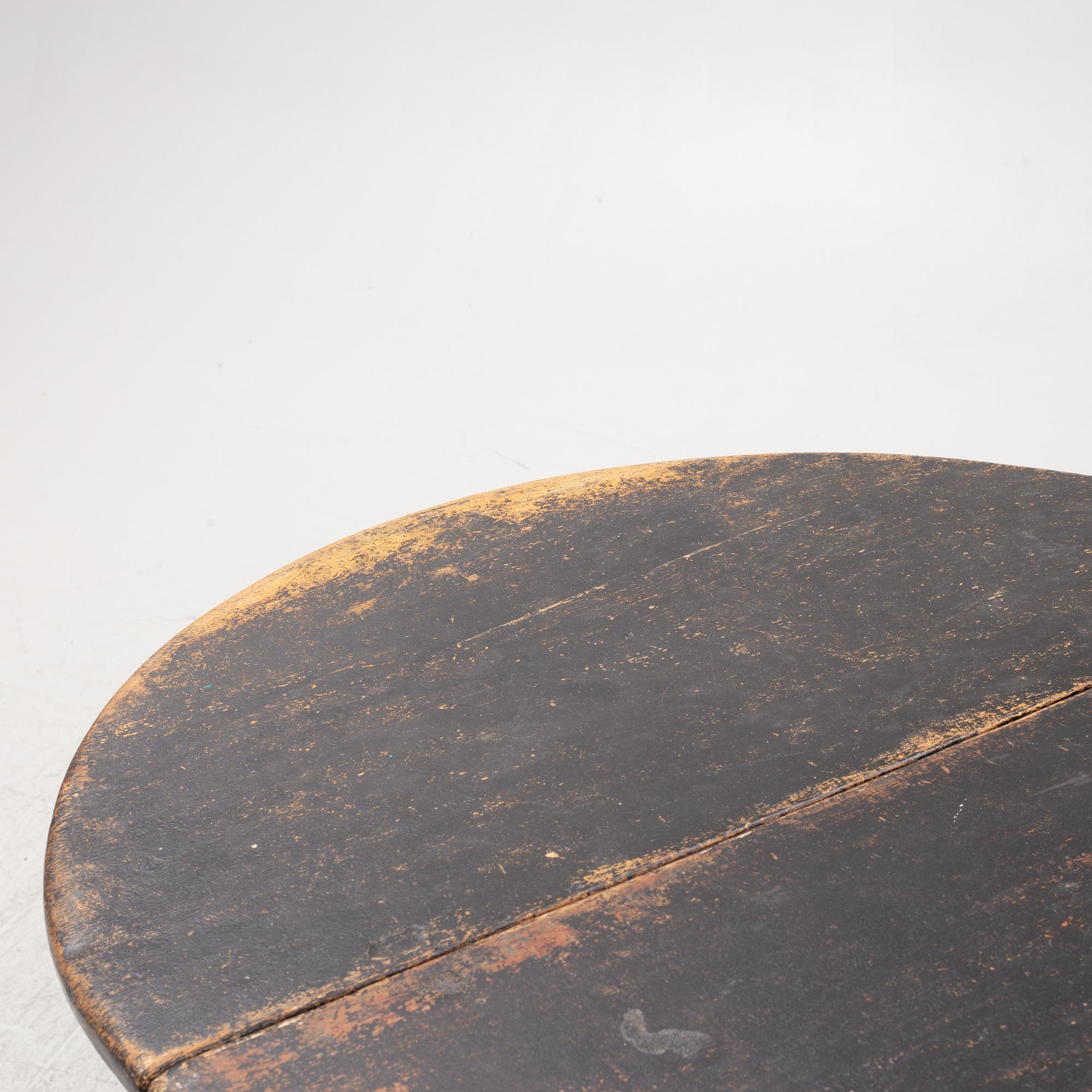 A Swedish wooden table, 19th century.