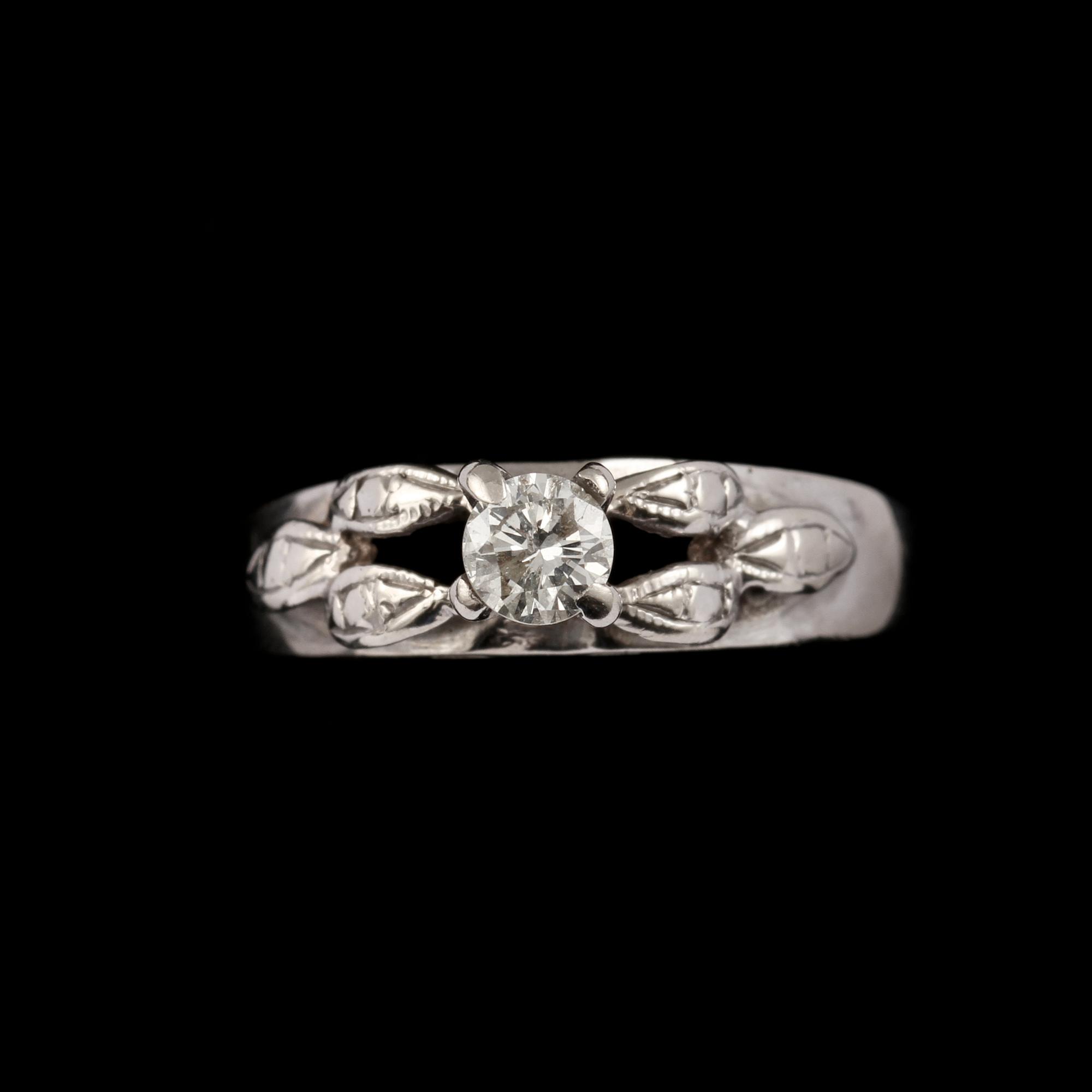 RING, 10k vitguld med briljantslipad diamant ca 0.25 ct. Vikt.