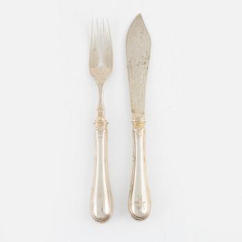 A 24-piece silver fish cutlery set, Anton Michelsen, Copenhagen, Denmark, 1897.