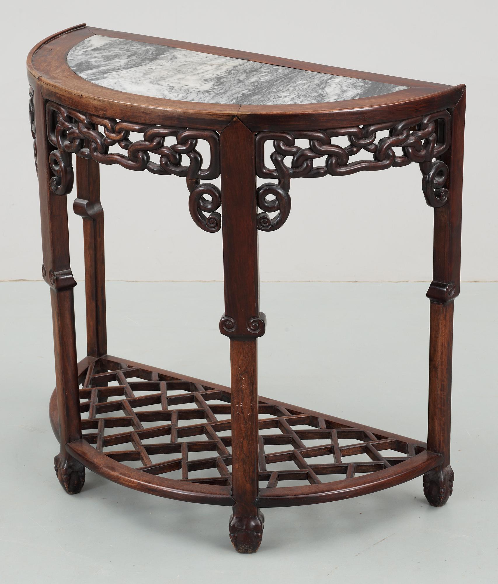 A hardwood and marble 'claw on ball' D-form console table, presumably late Qing dynasty.