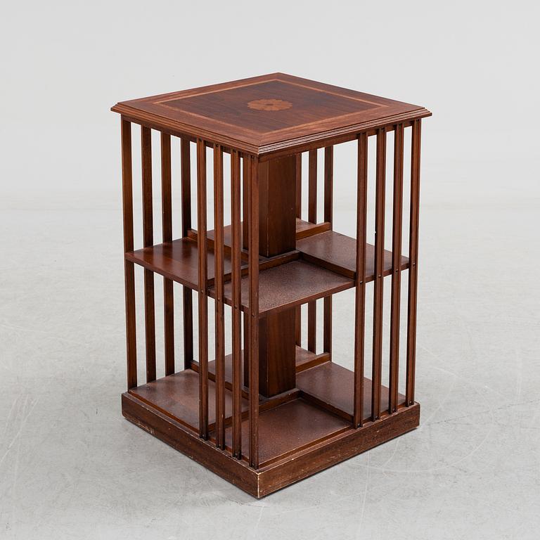 A mahogany veneered revolving bookcase, late 20th Century.