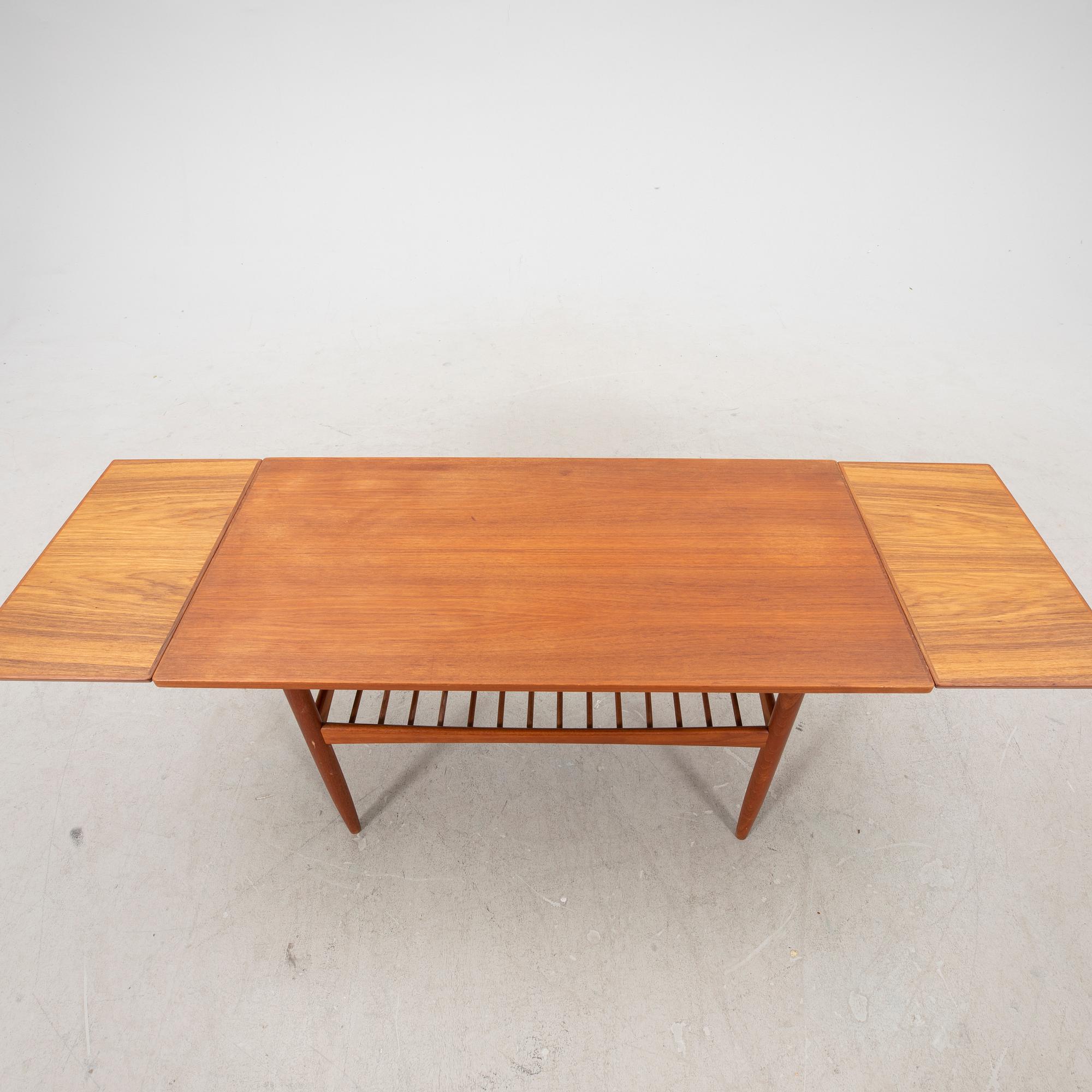 A mid 1900s Danish teak coffee table.