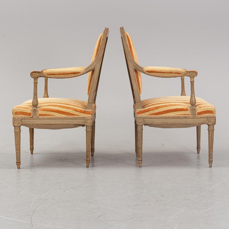 Karmstolar, ett par, Directoire-stil, omkring år 1900.