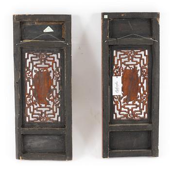 Two carved Chinese wooden decor parts, late Qing dynasty, 19th/20th Century.