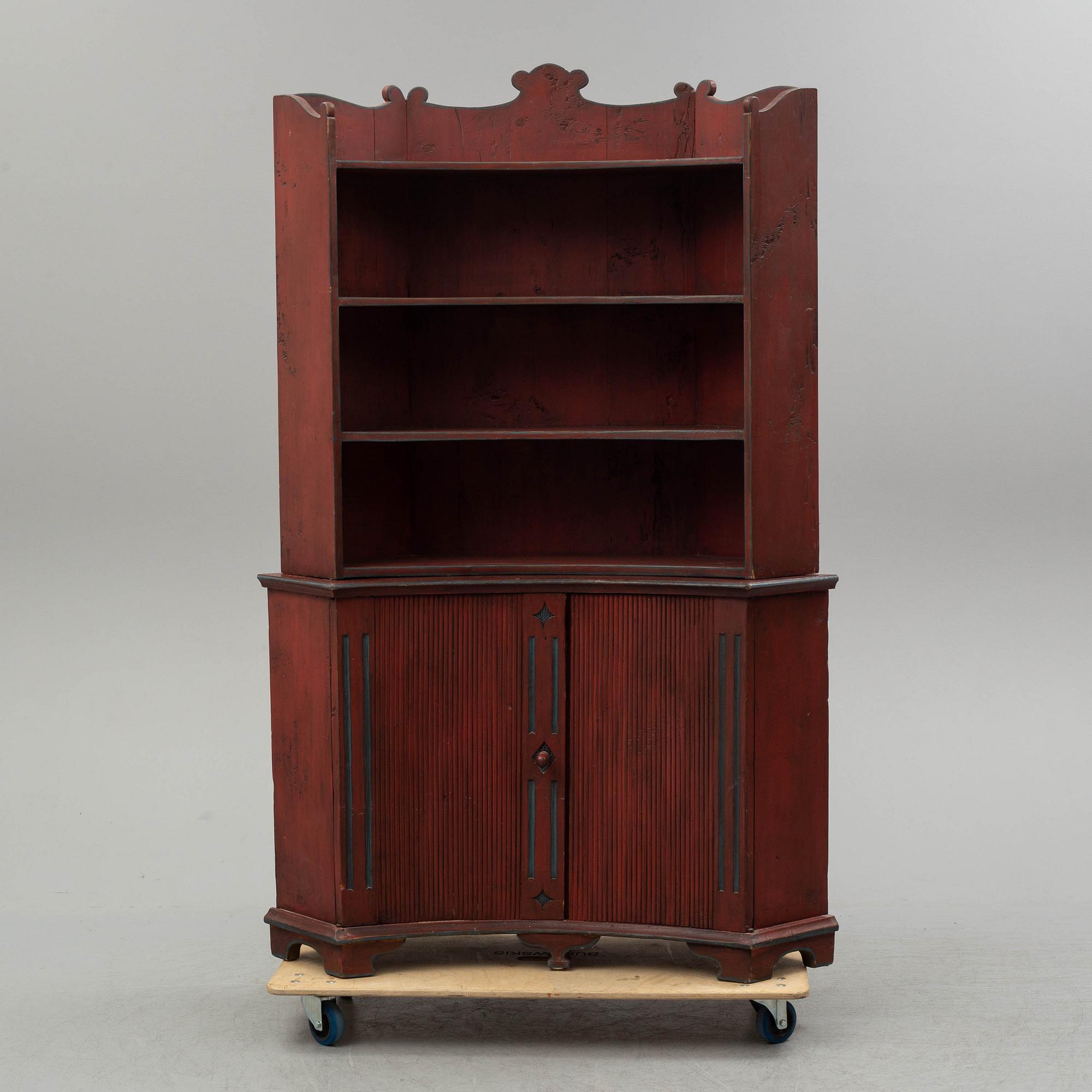 A 19th century corner cupboard.