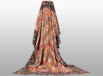 A Kelim carpet, c. 398 x 311 cm.