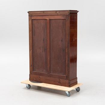A mahogany bookcase with cabinet, 20th Century.