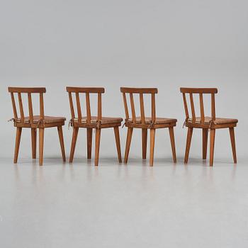 Axel Einar Hjorth, a set of four stained pine "Utö" chairs, Nordiska Kompaniet, Sweden, 1930s.