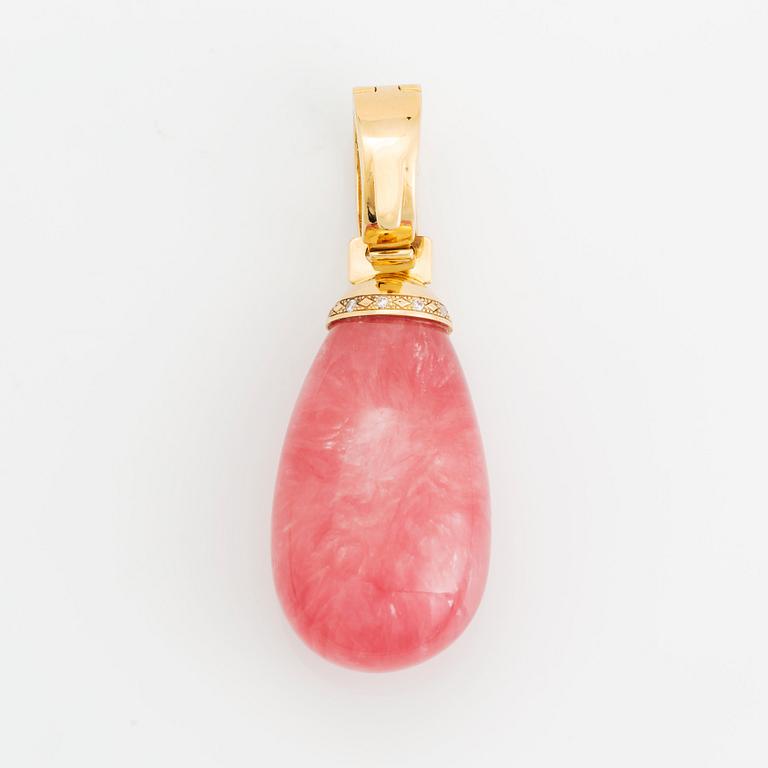 An 18K gold and rhodochrosite Acchinelli pendant set with round brilliant-cut diamonds.