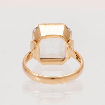 Ring och örhängen 18K guld samt fasettslipade bergskristaller.