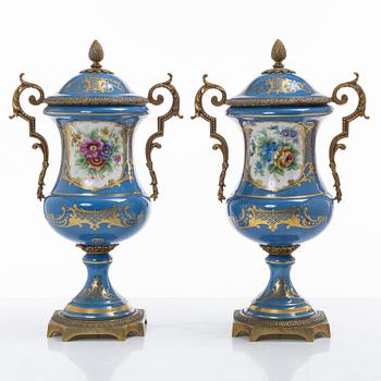 Decorative urns, a pair, porcelain, Sevres-like mark, circa 1900.