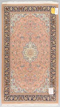 A Kashmir silk carpet, 161 x 92 cm.