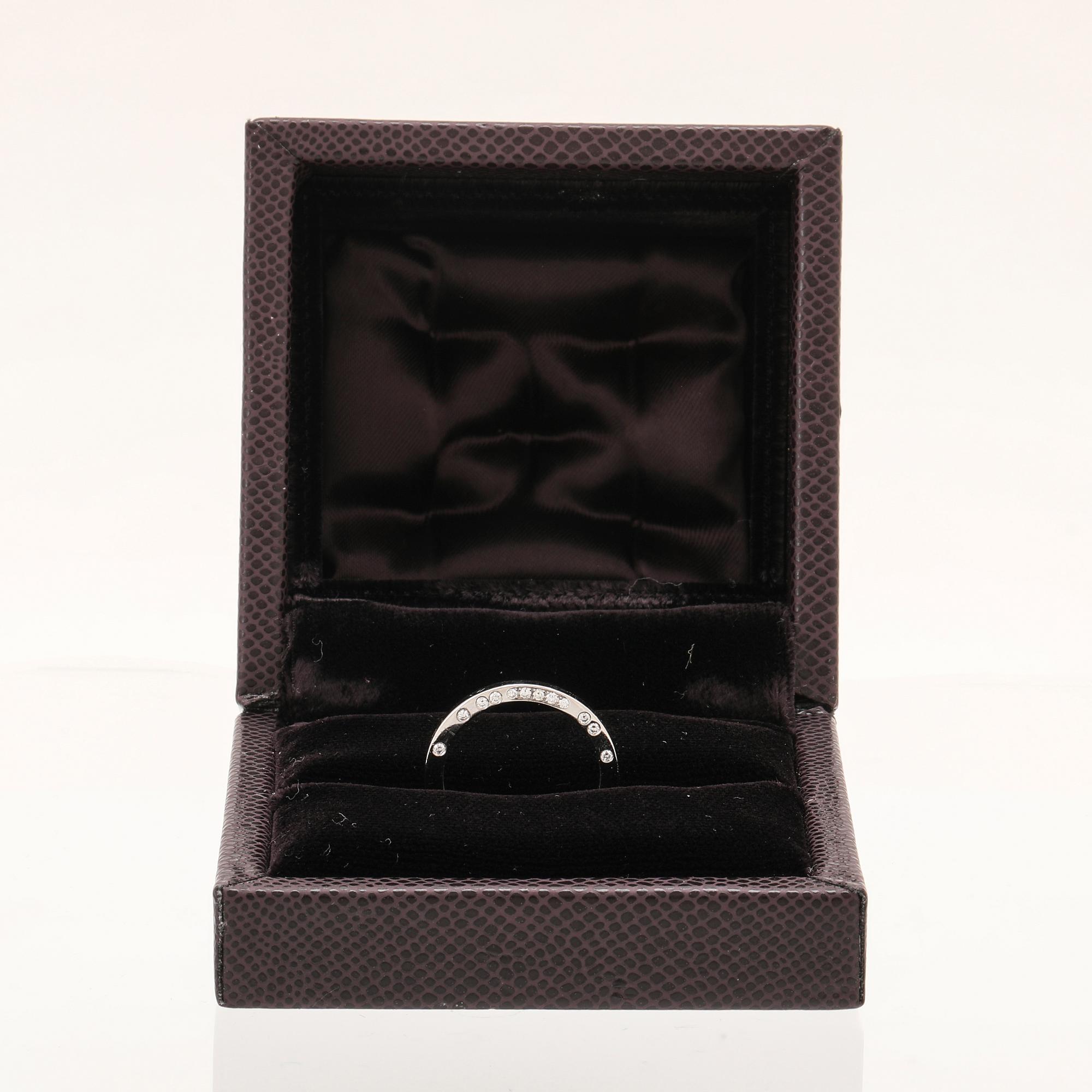 A “Divine Rita” ring 950 platinum and brilliant cut diamonds by Boucheron.