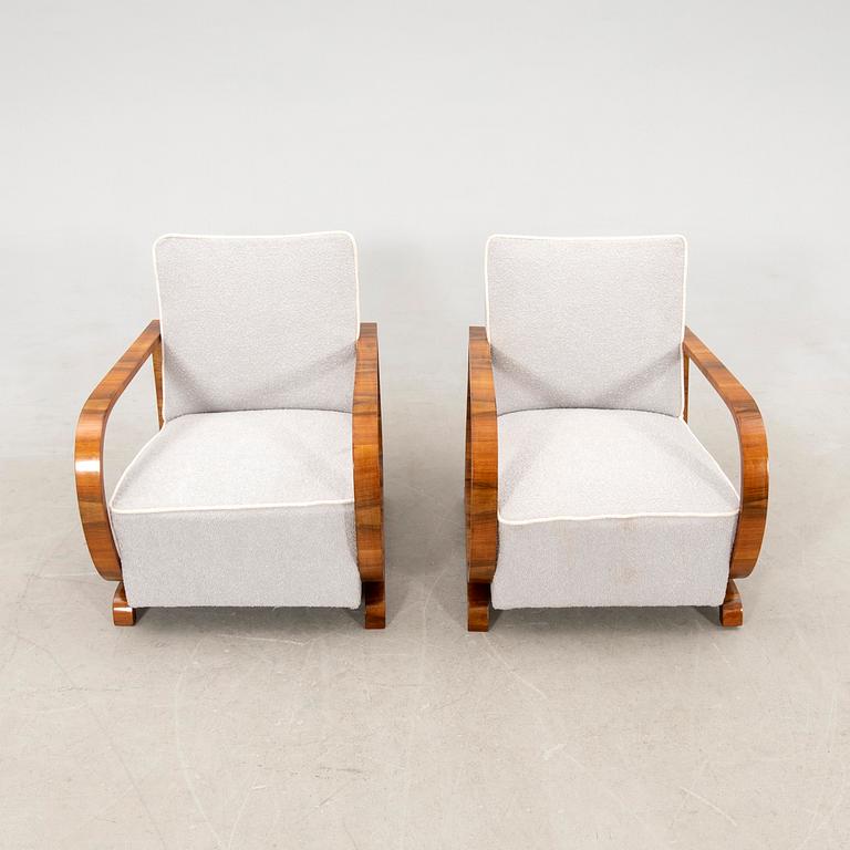 A pair of Art Deco armchairs.