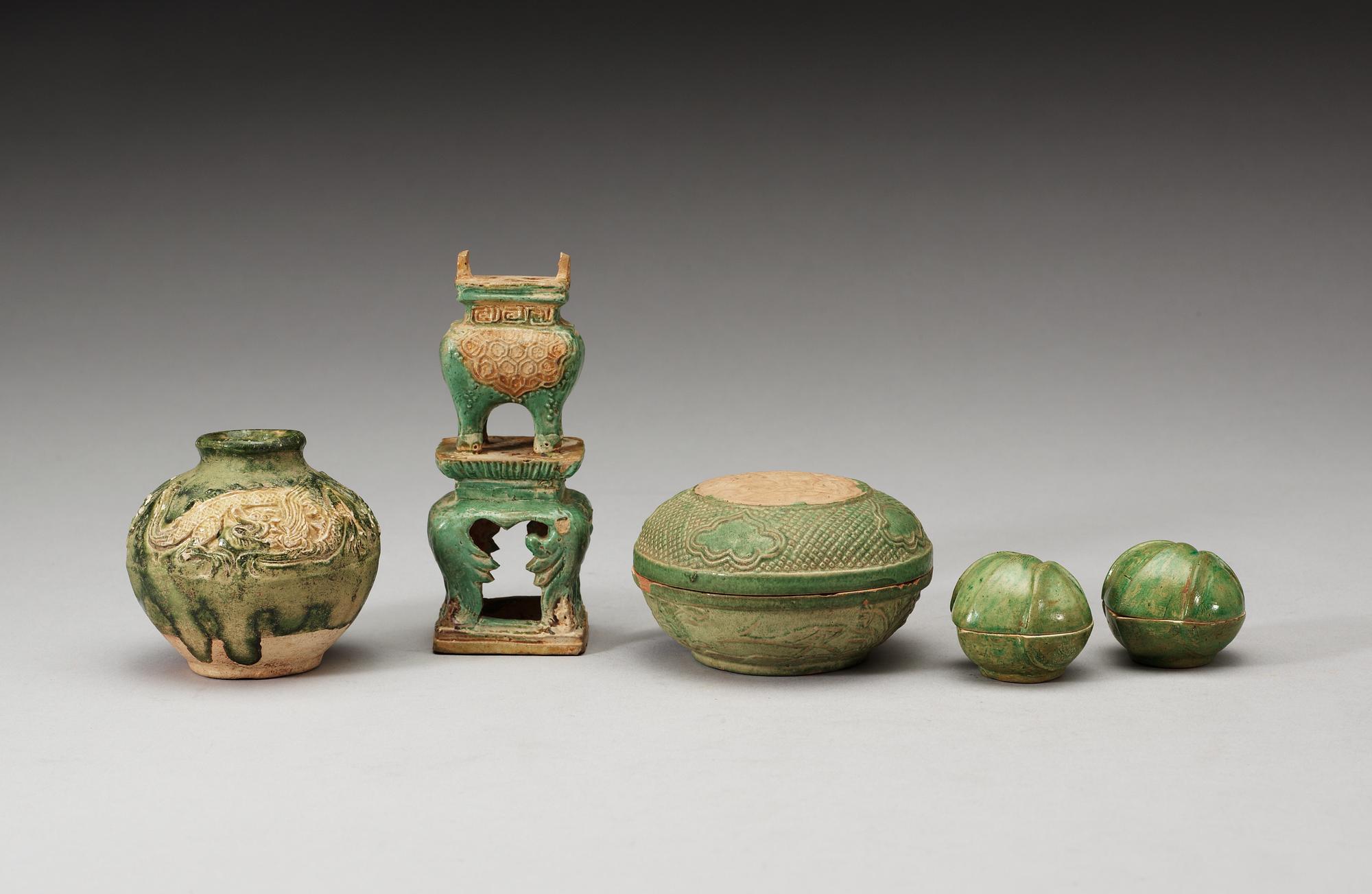 A group of five green glazed vessels, Ming dynasty, 17th Century.