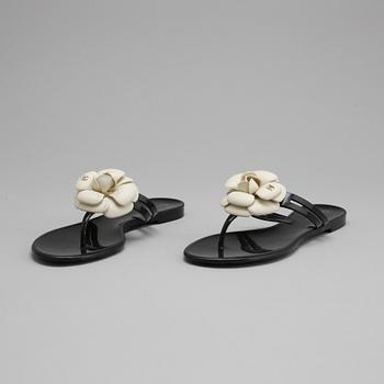 CHANEL, a pair of black plastic sandals. Size 38.