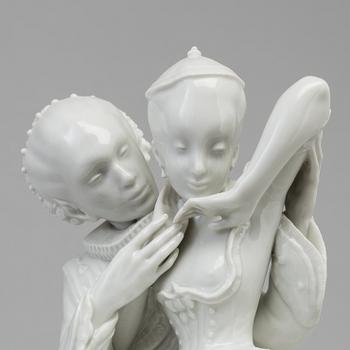 A white glazed Royal Copenhagen porcelain figure, Gerhard Henning, Danmark, 1920's.