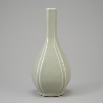 A presumably modern made celadon-glazed vase with Qianlong mark.