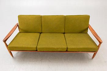 An Erik Wörtz 1962 walnut Kolding sofa for IKEA.